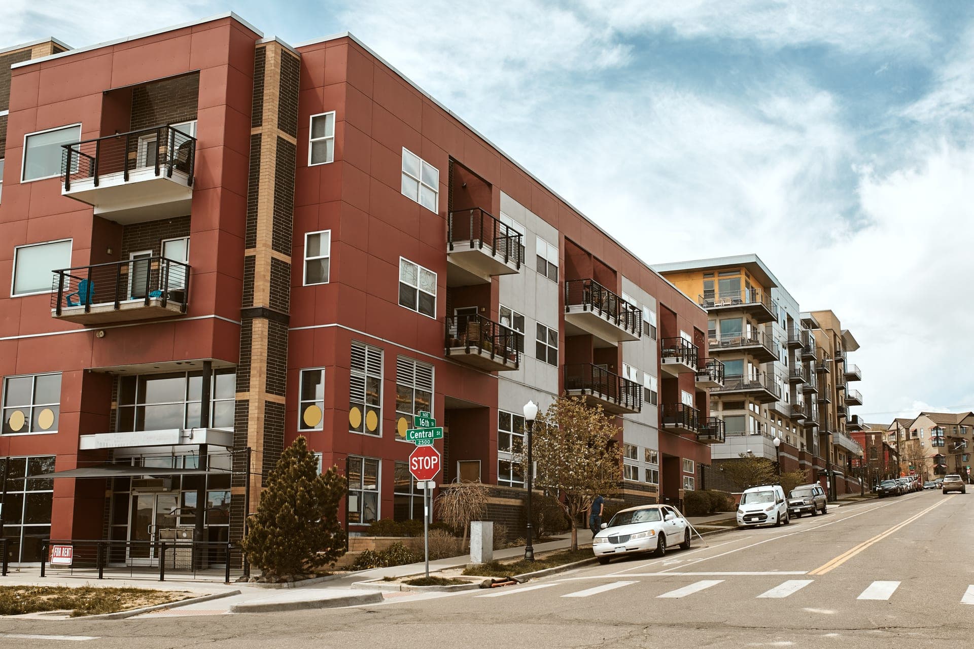 Denver apartment buildings with mountain views in the background
